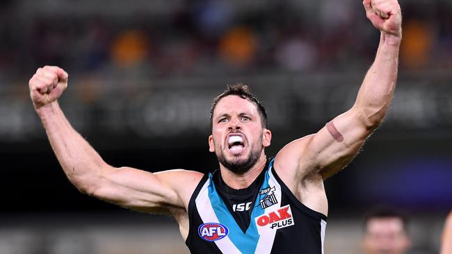 Travis Boak of the Power reacts after kicking a goal during the Round 3 AFL match between the Brisbane Lions and Port Adelaide Power at the Gabba in Brisbane, Saturday, April 6, 2019. (AAP Image/Dave Hunt) NO ARCHIVING, EDITORIAL USE ONLY