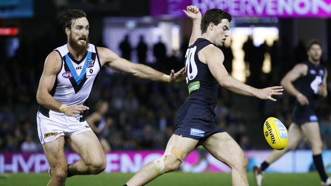 Lachie Plowman in action against Port Adelaide.