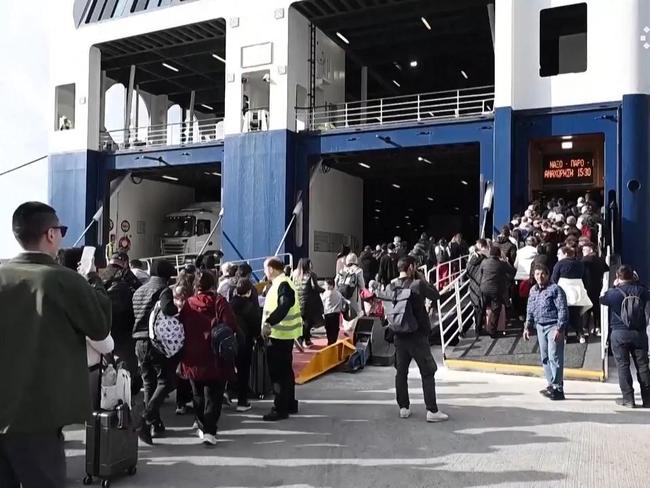 People queue to leave Santorini as earthquakes continue