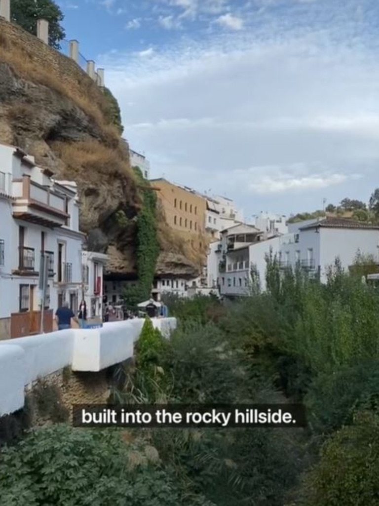 Many of the town’s homes are built underneath huge rock overhangs. Picture: TikTok/senses_of_spain