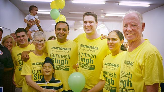 Then-newly elected Member for Coffs Harbour Gurmesh Singh and retired MP Andrew celebrate with their family and supporters.