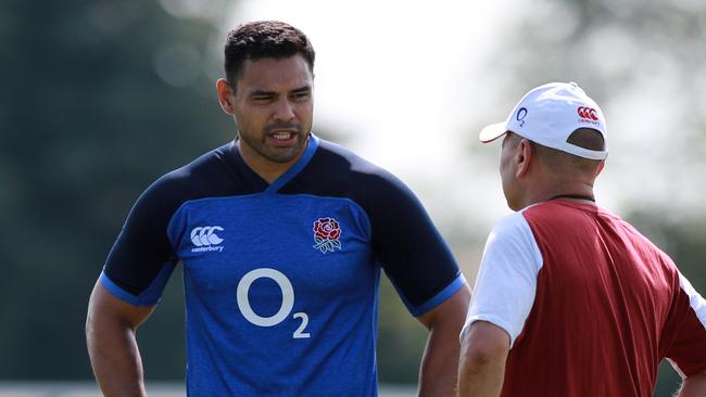 Ben Te'o talks to head coach Eddie Jones during his time with English rugby.