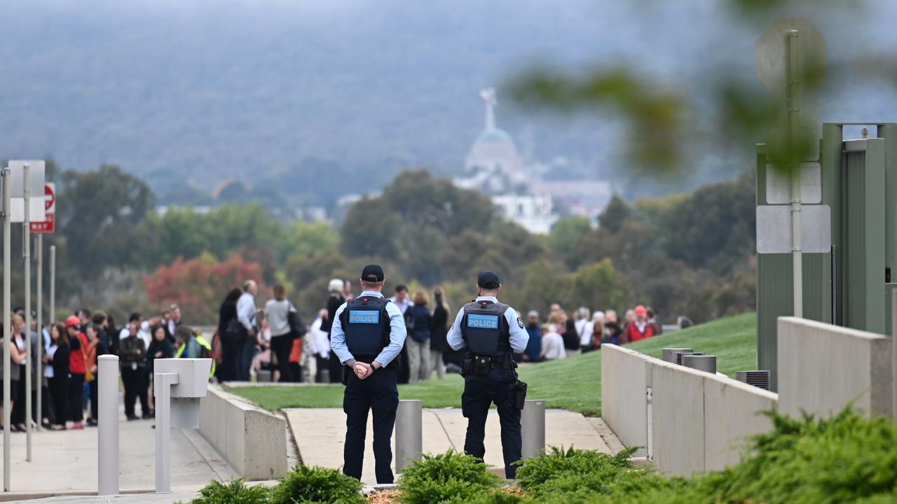 Emergency services on the scene with a haze of smoke on the horizon. Picture: NCA NewsWire / Martin Ollman