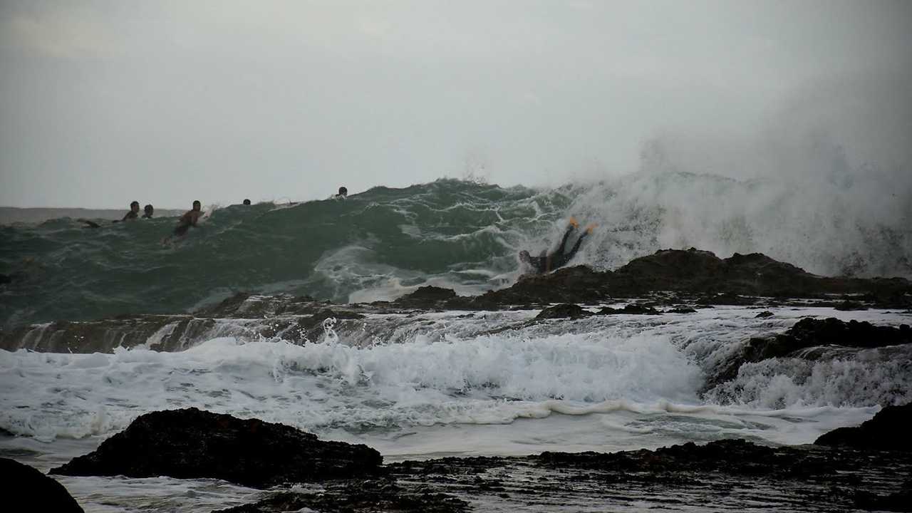 Surfers make the most of the big swell at Snapper Rocks. Picture: Mark Furler