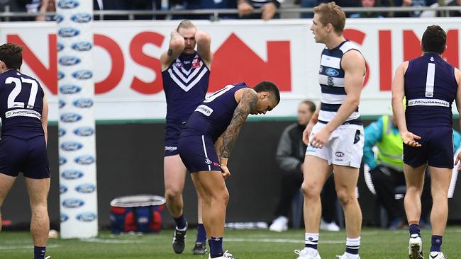 Geelong and Fremantle players react after Sunday’s game. Picture: AAP Images