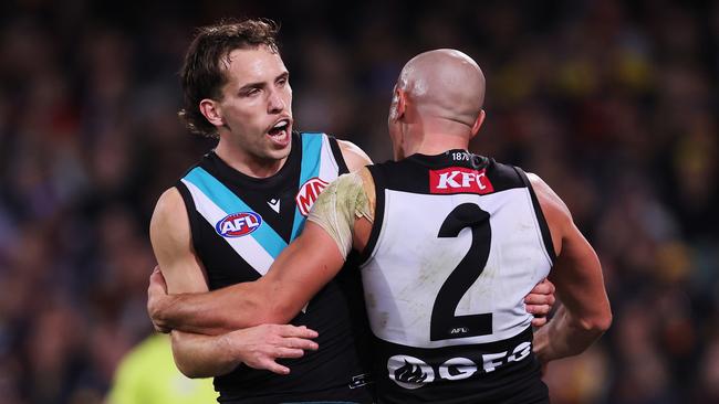 ADELAIDE, AUSTRALIA - JULY 29: Sam Powell-Pepper and Francis Evans of the Power celebrate a goal during the 2023 AFL Round 20 match between the Adelaide Crows and the Port Adelaide Power at Adelaide Oval on July 29, 2023 in Adelaide, Australia. (Photo by Sarah Reed/AFL Photos via Getty Images)