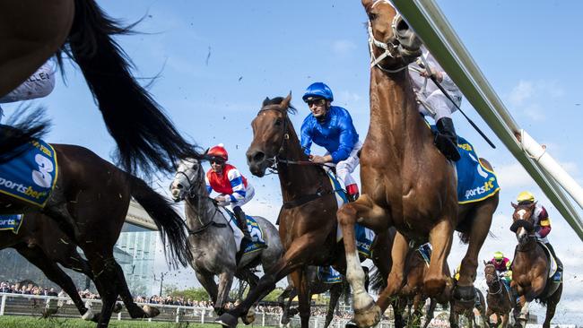 MELBOURNE, AUSTRALIA - OCTOBER 19: Andrea Atzeni riding Zardozi in first lap in Race 9, the Sportsbet Caulfield Cup - Betting Odds during Melbourne Racing at Caulfield Racecourse on October 19, 2024 in Melbourne, Australia. (Photo by Vince Caligiuri/Getty Images)