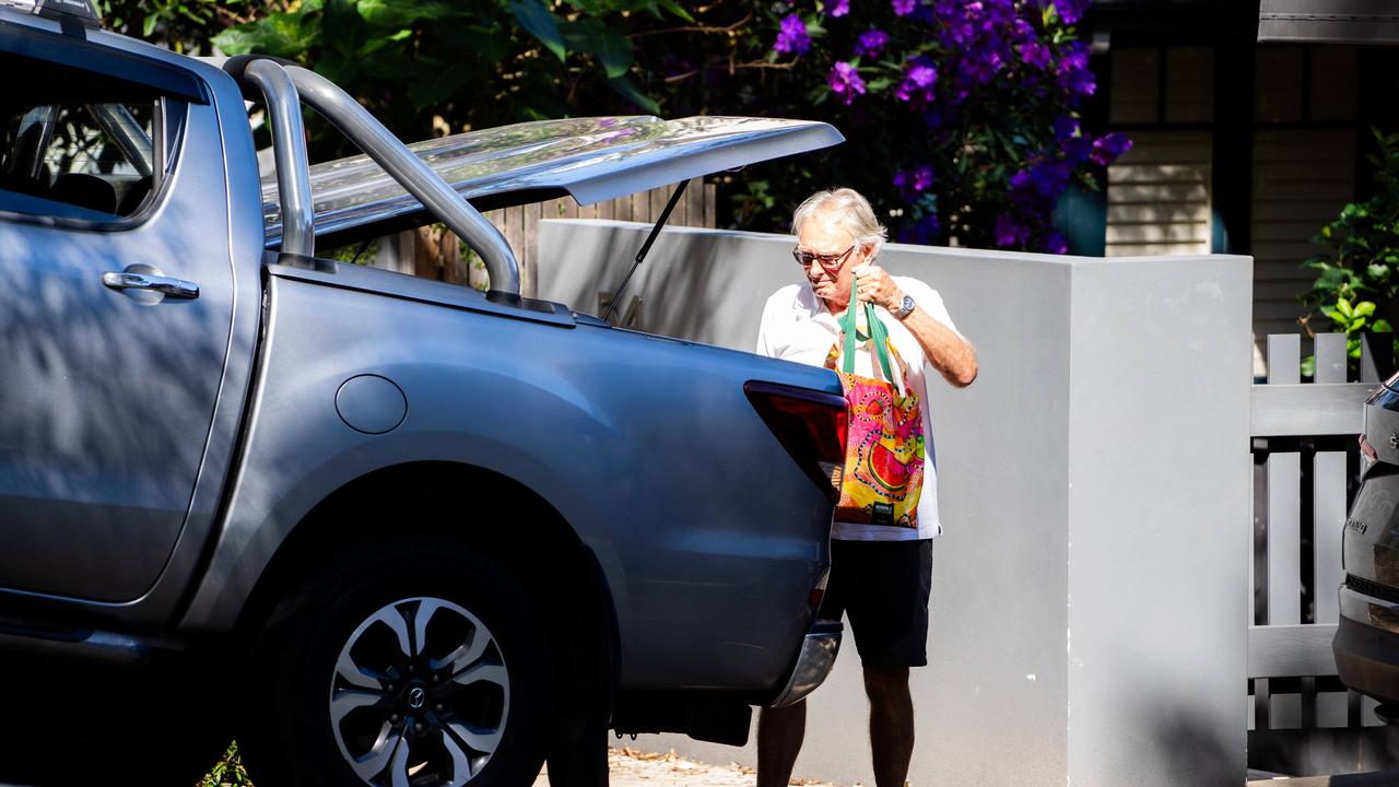 Mr Lehrmann’s friend, Rob Porter, claiming to be the removalist, packs his ute with his mate’s boxes and bags from inside the house. Picture: Tom Parrish