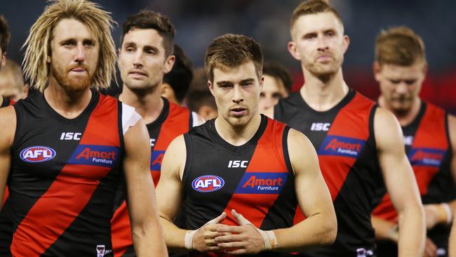 Essendon players leave Marvel Stadium after the loss to St Kilda. Picture: Getty