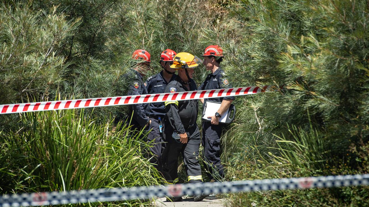 Firefighters at the scene. Emergency services were called about 4am, with investigators remaining on scene throughout the day. Picture: Brad Fleet