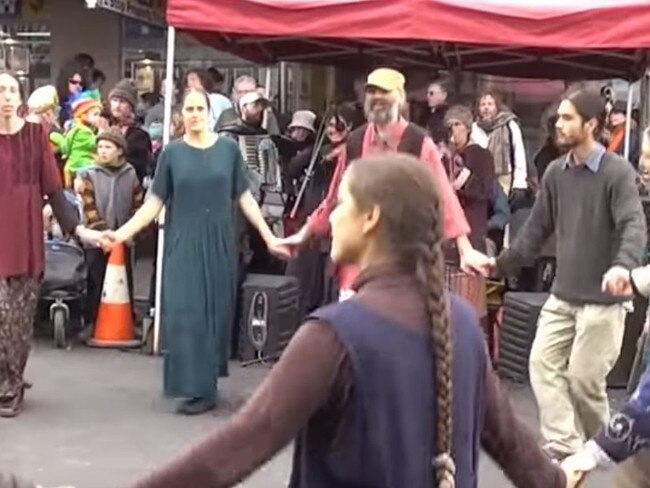 Twelve Tribes members in Katoomba during a Winter Magic celebration 2009. The group frequently attends markets and festivals where they sell produce. Picture: YouTube