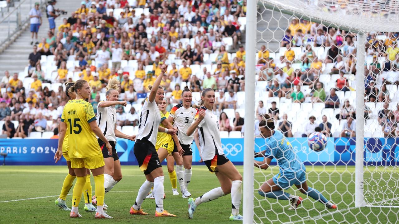 Marina Hegering celebrates scoring her team's first goal. Photo by Alex Livesey/Getty Images.