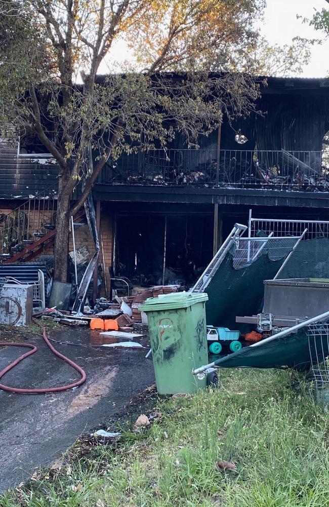 The burned house in Woodridge where a friendly truckie died on Sunday.