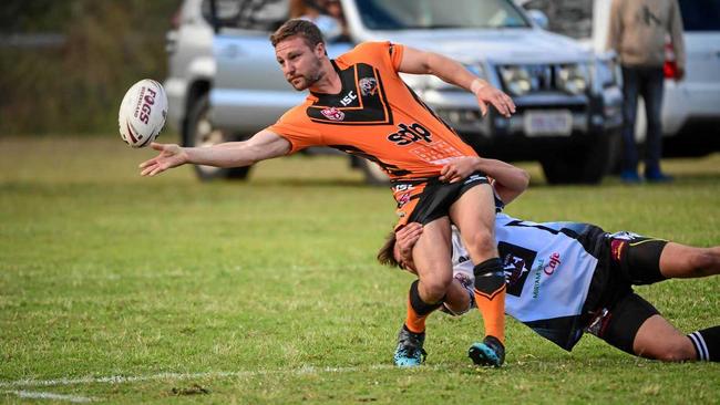 Avondales Jack Neighbour passes the ball as he is tackled. Picture: Brian Cassidy