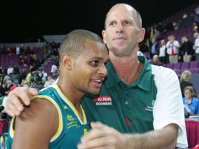 Boomers coach Brian Goorjian hugs Patrick Mills after Australia v New Zealand 2008 Olympic Games qualifying series game at Entertainment Centre in Sydney.