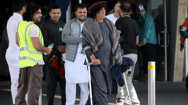 A survivor of the Christchurch mosque attacks, Taj Mohammed Kamra, centre, leaves congregational Friday prayers, two days ahead of the first anniversary of the Christchurch mosque shootings, at Horncastle Arena in Christchurch Picture: AFP