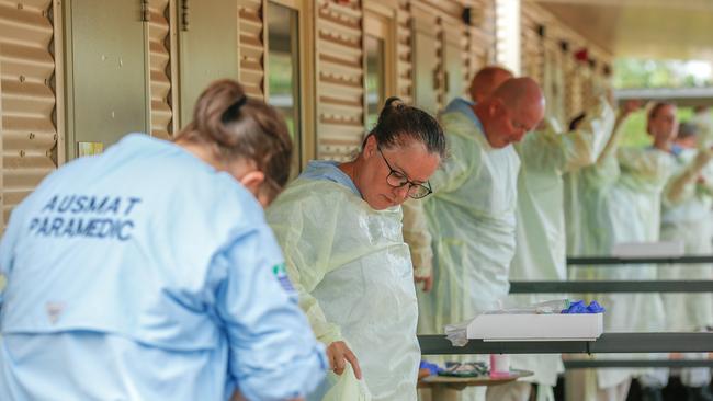 PPE drill at the NCCTRC/AUSMAT sections of the Howard Springs Corona virus quarantine Facility on the outskirts of Darwin in The Northern Territory. Picture GLENN CAMPBELL