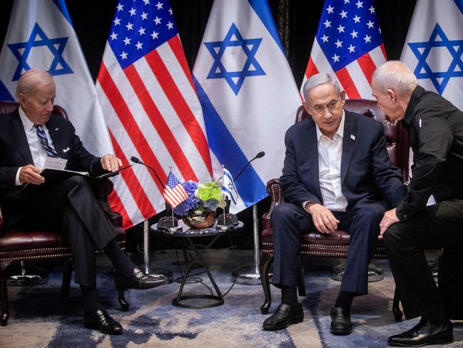 Israeli Prime Minister Benjamin Netanyahu confers with Defence Minister Yoav Gallant during their meeting with US President Joe Biden. Picture: AFP