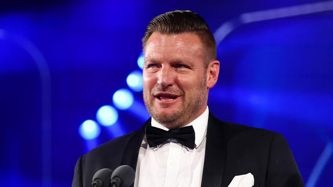 Former big server and now member for Nepean Sam Groth speaks on stage during the 2024 Newcombe Medal. (Photo by Graham Denholm/Getty Images for Tennis Australia)