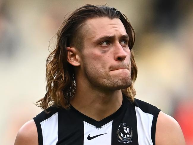 MELBOURNE, AUSTRALIA - MAY 01: Darcy Moore of the Magpies looks dejected after losing the round seven AFL match between the Collingwood Magpies and the Gold Coast Suns at Melbourne Cricket Ground on May 01, 2021 in Melbourne, Australia. (Photo by Quinn Rooney/Getty Images)