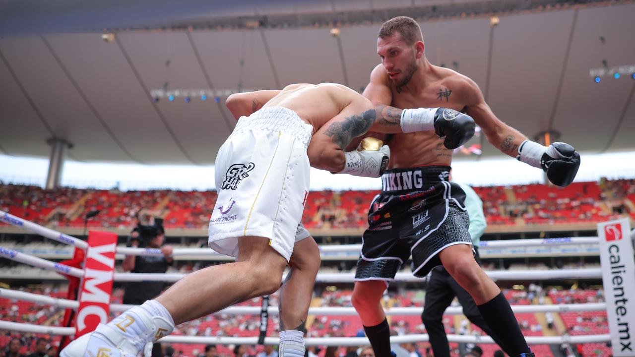 Steve Spark of Australia punches Gabriel Gollaz of Mexico. Picture: Getty Images