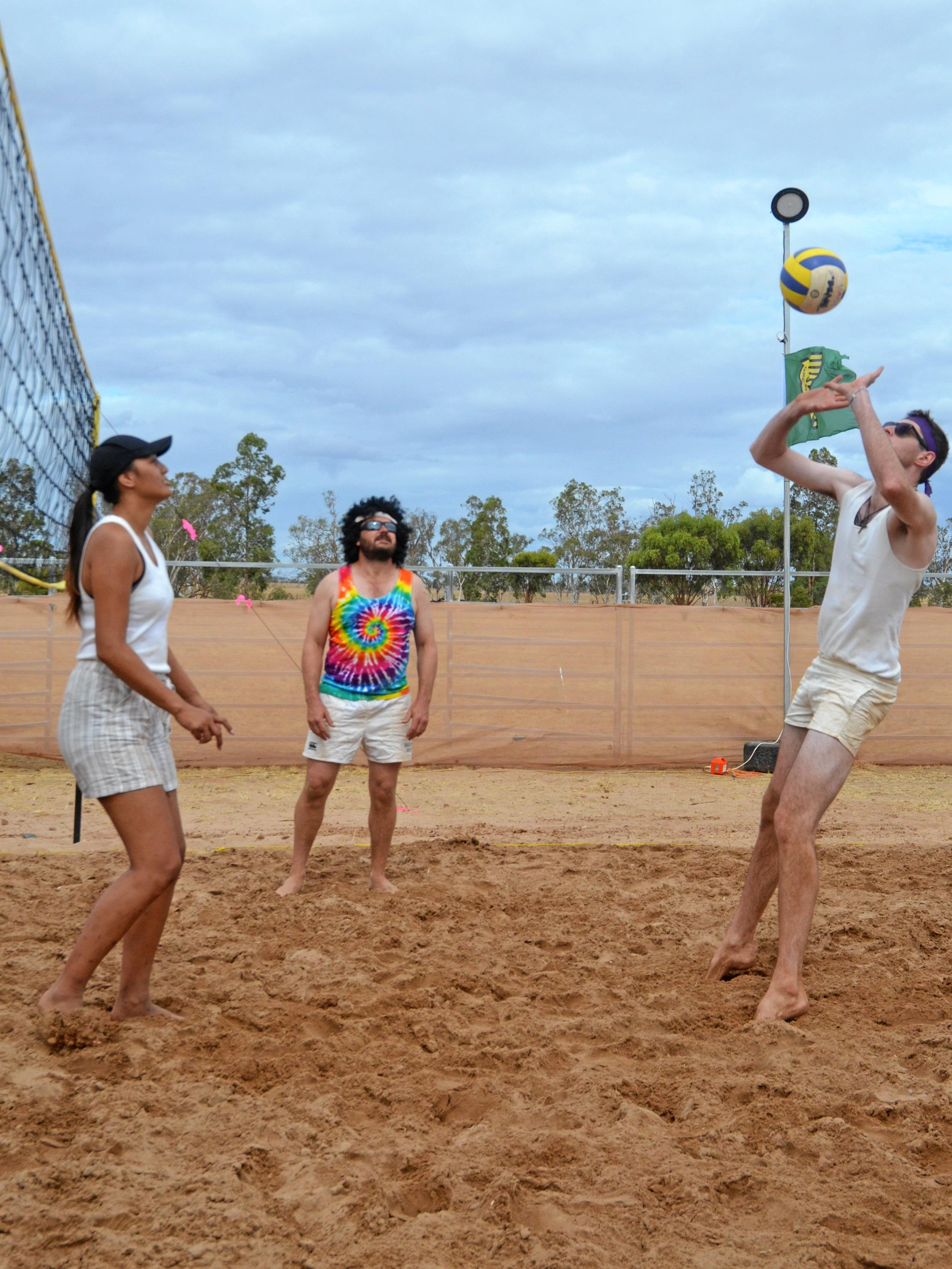 Mitchell Davis gives a solid return at the Dulacca Sports Club annual Bush Beach Volleyball tournament. Picture: Kate McCormack