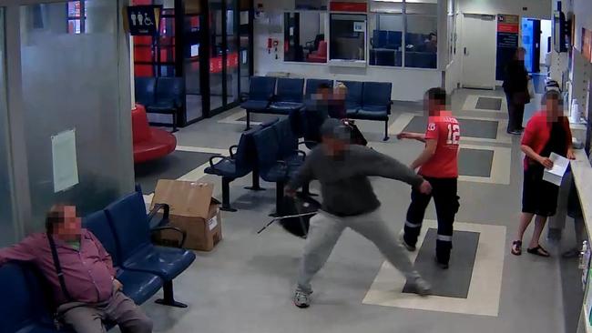 CCTV provided by Royal Melbourne Hospital shows a man throwing a chair