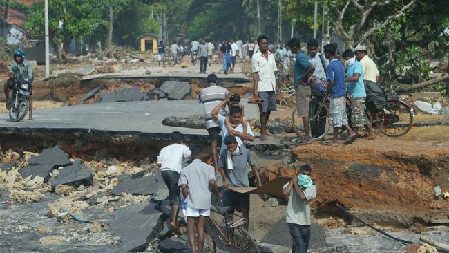 A broken road near Hikkaduwa on Sri Lanka's south coast. Picture: Phil Hillyard