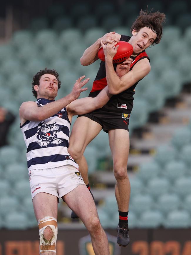 Brandon Leary North Launceston marks over Tyler Martin Lauderdale. TSL grand final 2024 - North Launceston V Lauderdale. Picture: Nikki Davis-Jones