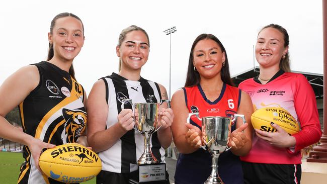 SFLW players Kingborough Tigers Hailee Baldwin, Kelli Smith of Claremont, Chelsea Thomas of North Hobart and Hutchins Molly Garrett at North Hobart Oval ahead of the division one and division two grand finals.Picture: Linda Higginson