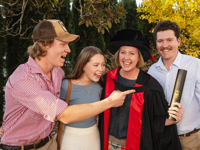 Doctor of Philosophy graduate Anthea Fagan with her children Hamish (left), Dimity and Duncan Chalmers at a UniSQ graduation ceremony at Empire Theatres, Wednesday, June 28, 2023. Picture: Kevin Farmer