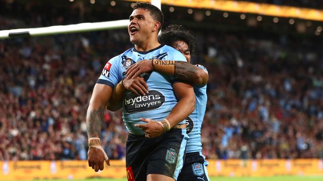 BRISBANE, AUSTRALIA – JUNE 27: Latrell Mitchell of the Blues celebrates after scoring a try during game two of the 2021 State of Origin series between the Queensland Maroons and the New South Wales Blues at Suncorp Stadium on June 27, 2021 in Brisbane, Australia. (Photo by Chris Hyde/Getty Images)