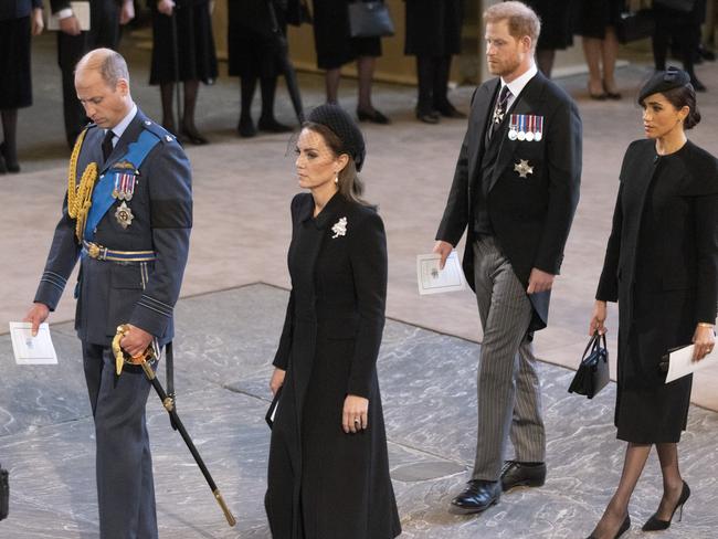 Prince William, Kate Middleton, Prince Harry and Meghan Markle arrive as the coffin bearing the body of Her majesty Queen Elizabeth II completes its Journey from Buckingham Palace to Westminster Hal. Picture: Darren Fletcher – WPA Pool/Getty Images.