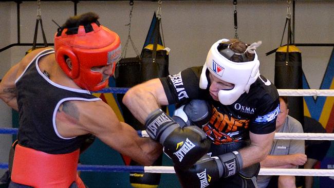 Jeff Horn and his sparring partner trade big shots.