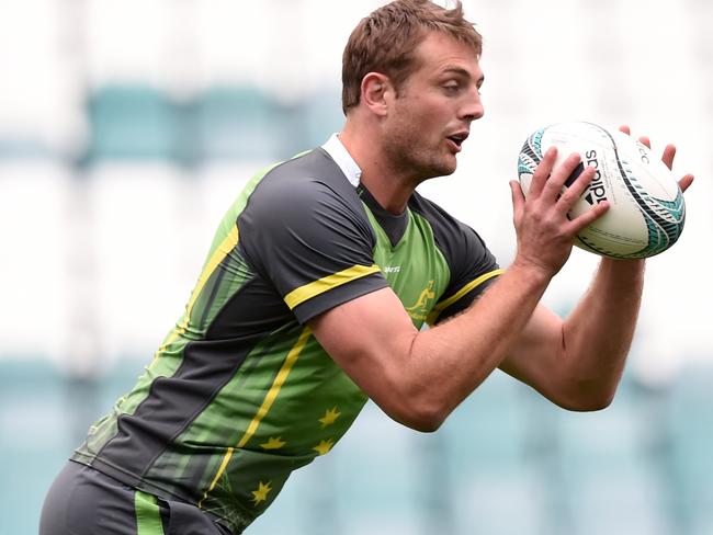 Australian rugby union player Dean Mumm takes part in a training session in Sydney on Tuesday, Aug. 23, 2016. The Wallabies will play the New Zealand All Blacks in the second match of the Bledisloe Cup series in Wellington, New Zealand, on Saturday. (AAP Image/Paul Miller) NO ARCHIVING