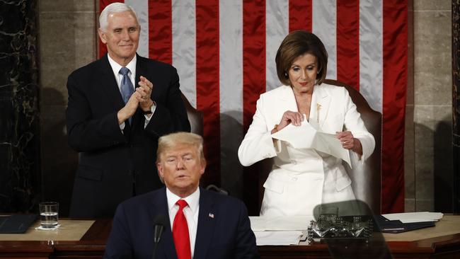 House Speaker Nancy Pelosi steals the show at the end of the State of the Union, tearing up her copy of Donald Trump's address. Picture; AP.