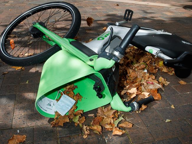 DAILY TELEGRAPH. An e-bike from bike & scooter share company Lime, tipped over on the sidewalk at Martin Place, Sydney. 05/02/2024. Picture by Max Mason-Hubers