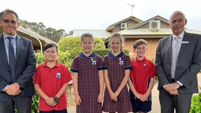 Nowra Christian School Head of Primary, Paul McLennan, left, with primary school prefects Levi O’Reilly, Jada Lewis, Hannah Jones, Benjamin Graham, and Principal Rob Bray.