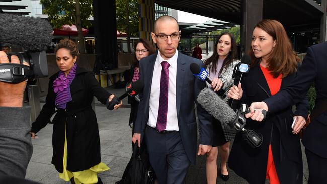 ANZ Bank's Benjamin Steinberg leaving the Brisbane Magistrate Court in Brisbane today. Picture: AAP/Darren England.