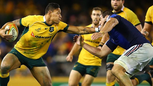 MELBOURNE, AUSTRALIA - JUNE 14: Israel Folau of the Wallabies runs the ball during the second International Test Match between the Australian Wallabies and France at Etihad Stadium on June 14, 2014 in Melbourne, Australia. (Photo by Mark Nolan/Getty Images)
