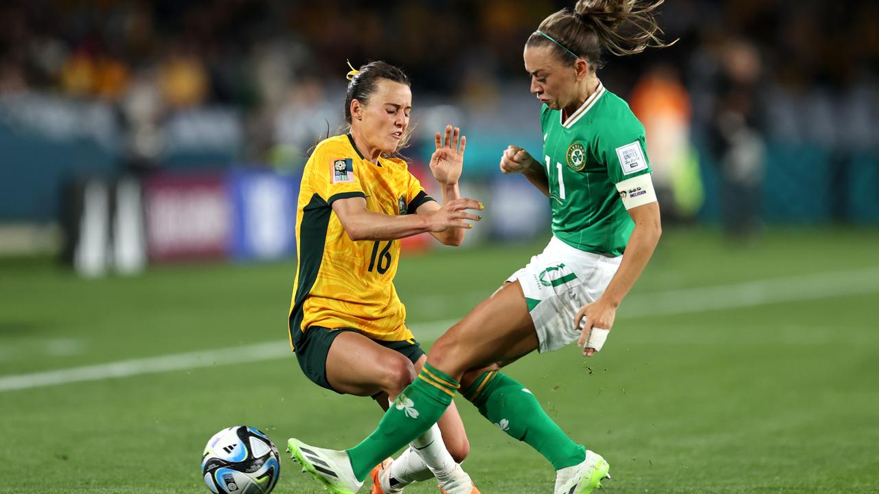 Hayley Raso is crunched by Ireland’s Katie McCabe. Picture: Getty