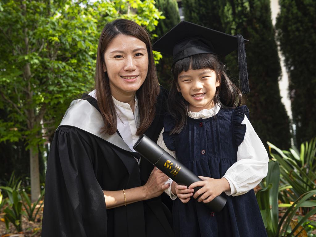 Graduate Diploma of Business graduate Suik May Kew with daughter Eliza Kew at a UniSQ graduation ceremony at The Empire, Wednesday, October 30, 2024. Picture: Kevin Farmer