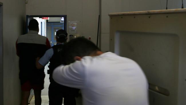 Strike Force Pinnacle was set up to infiltrate and dismantle the drug syndicate. Alleged offenders are pictured being transferred to Dubbo Police Station after they were arrested in Wellington in May 2020. Picture: NSW Police