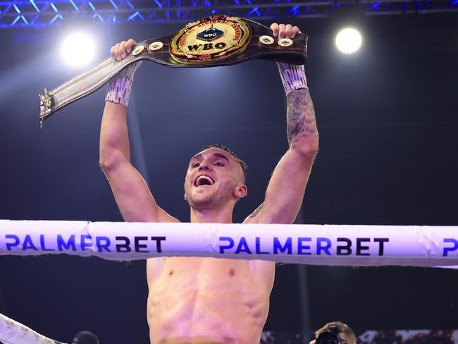 Goodman with the spoils of victory. Picture: Getty Images