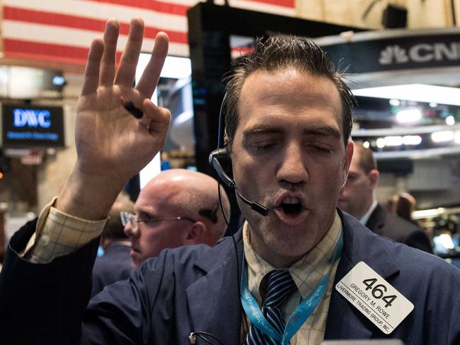 NEW YORK, NY - MAY 8: Traders work on the floor of the New York Stock Exchange (NYSE) on May 8, 2015 in New York City. Positive Jobs Reports sent the Dow Jones Industrial Average sharply higher. Andrew Renneisen/Getty Images/AFP == FOR NEWSPAPERS, INTERNET, TELCOS & TELEVISION USE ONLY ==
