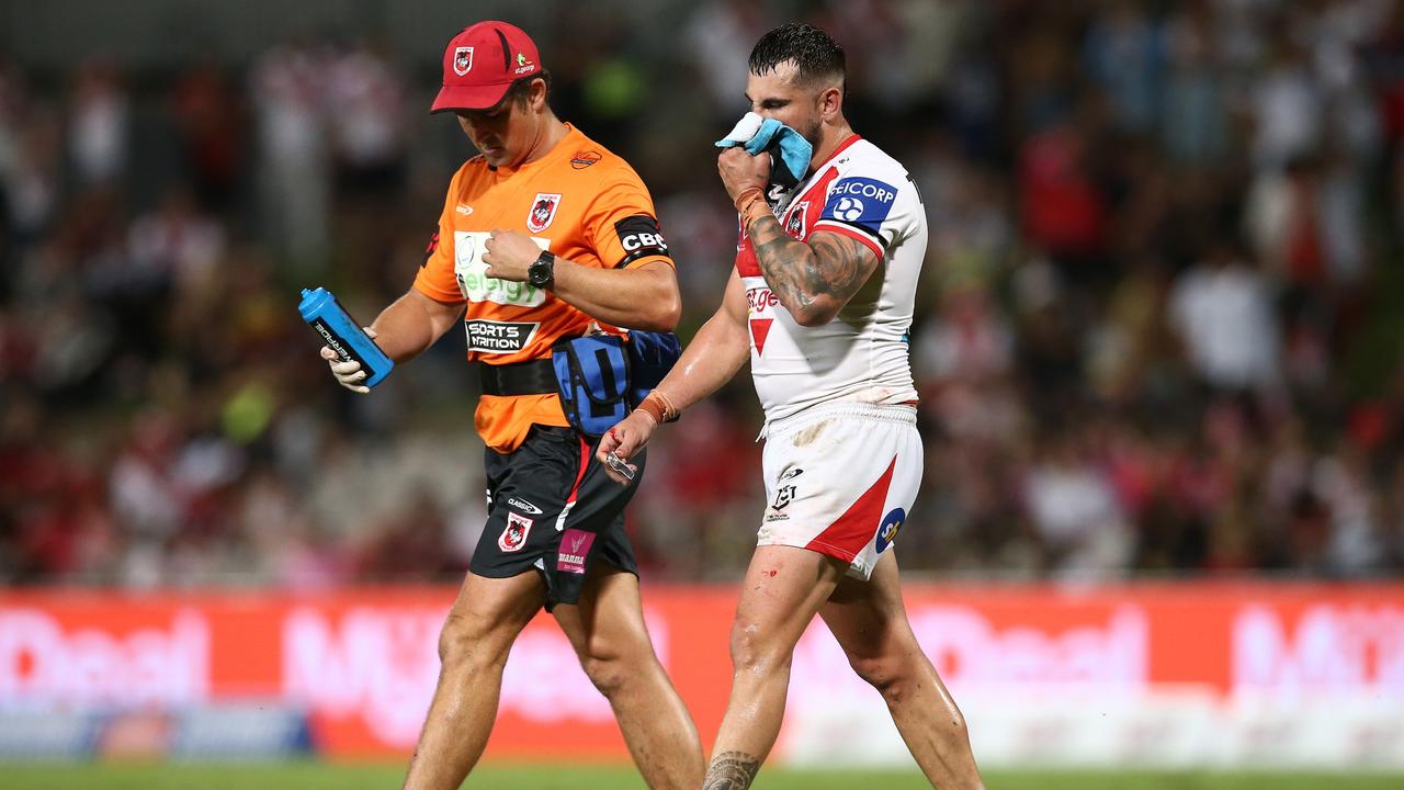 NRL referees can stop the action if a player suffers a head knock. (Photo by Jason McCawley/Getty Images)