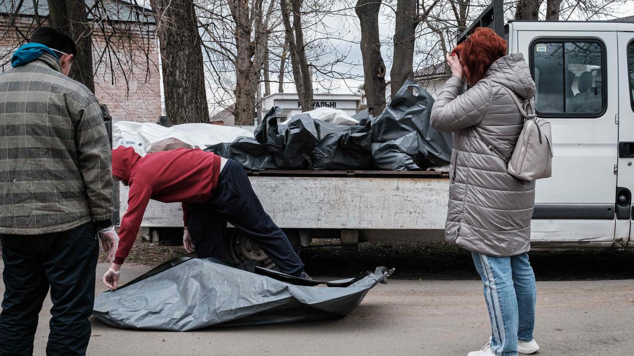 Bodies lined the streets of Bucha. Picture: Yasuyoshi Chiba/AFP