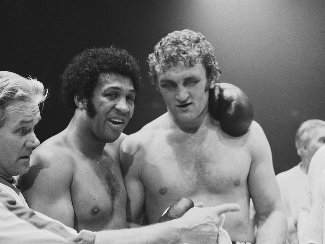 Joe Bugner, pictured here in 1974 with Jimmy Ellis, is currently living out his glory days. Picture: Evening Standard/Hulton Archive/Getty