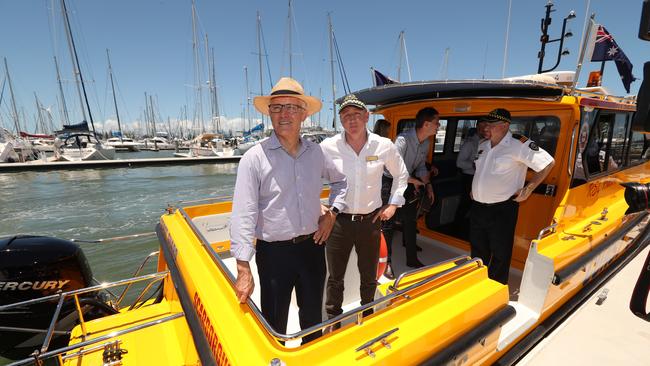 Former Prime Minister Malcolm Turnbull inspects a refurbished Redcliffe Coast Guard boat last year with federal member for Petrie Luke Howarth. Photo: Lyndon Mechielsen/The Australian.