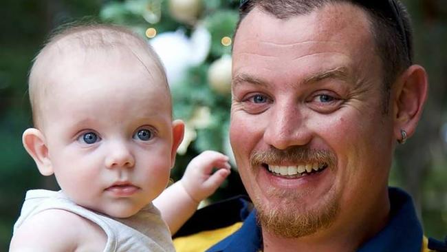 Geoffrey Keaton, 32, with his son Harvey. Picture: RFS NSW